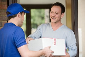 Man having a parcel delivered